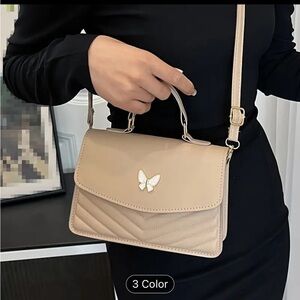 Brand new over the shoulder tan purse